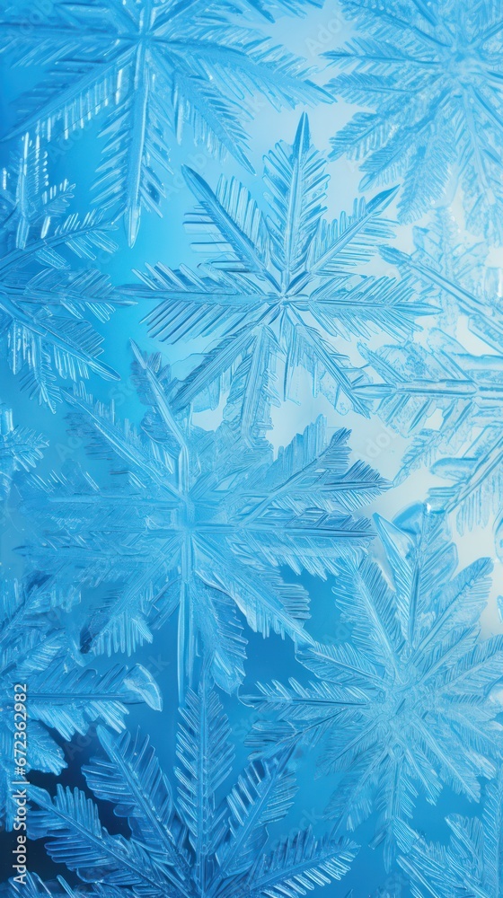 Close-up of intricate ice crystals forming a mesmerizing symmetrical pattern on a blue background Close-up of intricate ice crystals forming a mesmerizing symmetrical pattern on a blue background