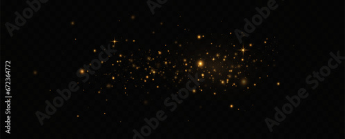 Golden sequins glow with many lights. Glittering dust. Luxurious background of golden particles.	 photo