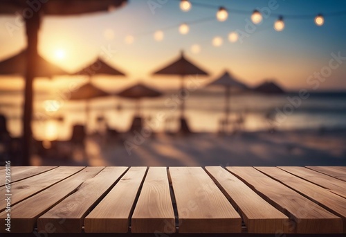 Wooden table and blur beach cafes background with bokeh lights High quality photo