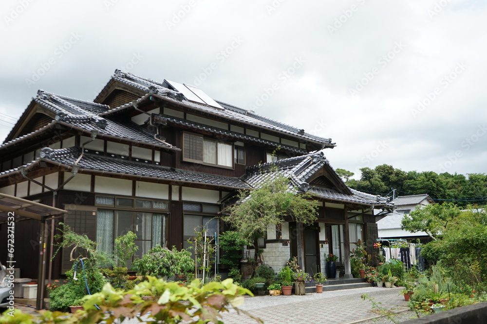 Typical Japanese-style wood-structured Machiya with a well-maintained garden.