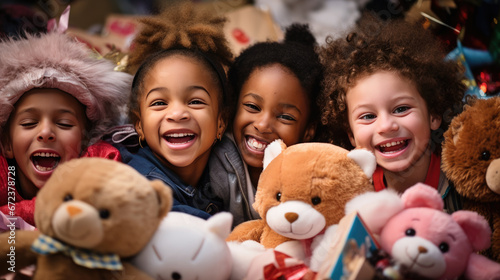 Joyful children surrounded by plush Christmas toys and gifts smile and laugh in a heartwarming holiday setting. photo