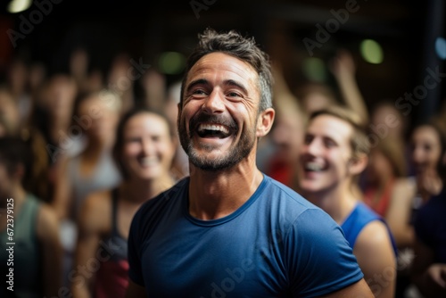 A gym instructor guiding a group fitness class. photo