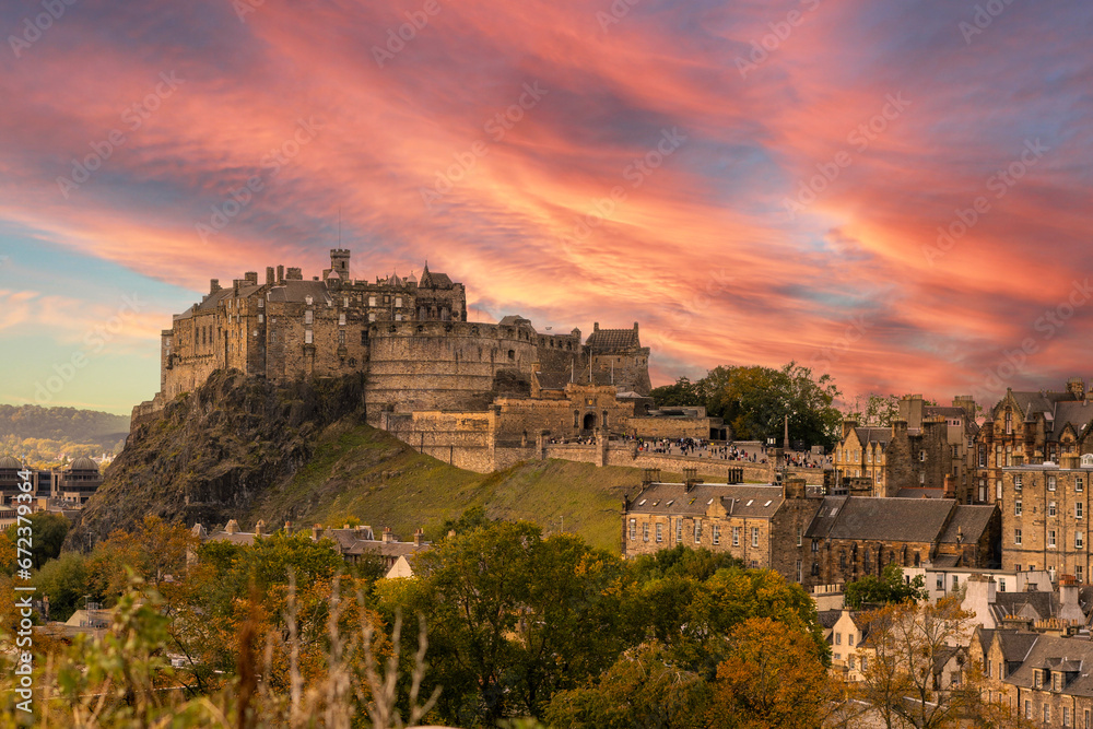 The skyline of Edinburgh with the Castle  in an autumn sunset