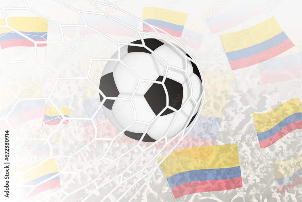 National Football team of Colombia scored goal. Ball in goal net, while football supporters are waving the Colombia flag in the background. National Football team of Colombia scored goal. Ball in goal net, while football supporters are waving the Colombia flag in the background.