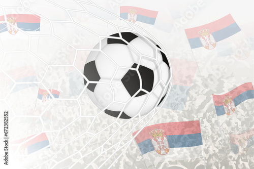 National Football team of Serbia scored goal. Ball in goal net, while football supporters are waving the Serbia flag in the background.