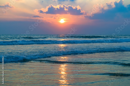 Tropical beach  blue sea and sunset.