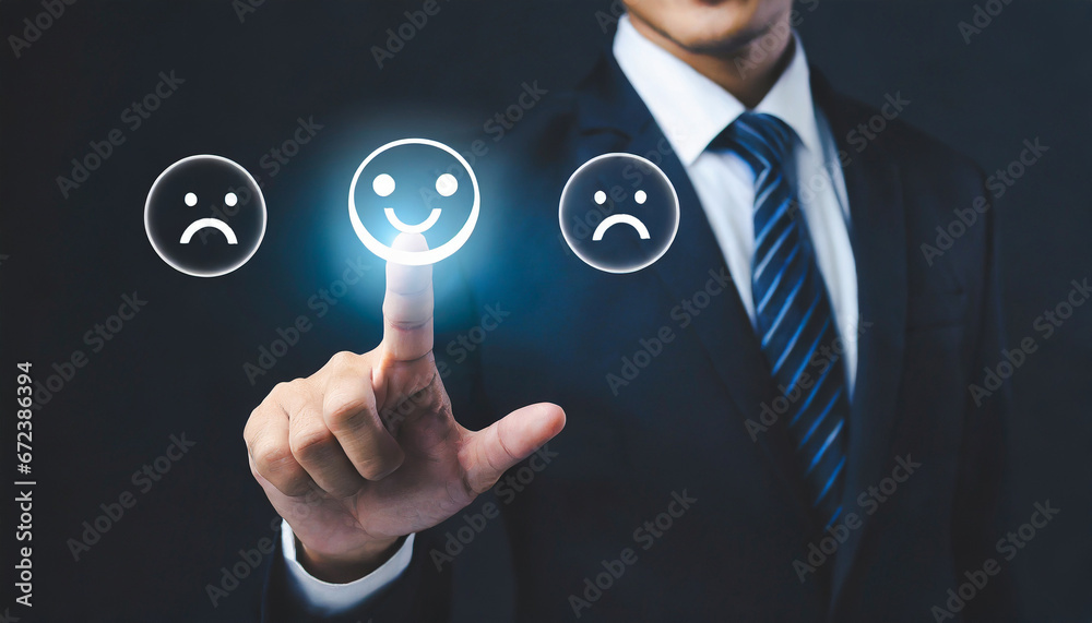 Finger of businessman touching and check mark icon face emoticon smile on dark background, service mind, service rating. Satisfaction and customer service concept Finger of businessman touching and check mark icon face emoticon smile on dark background, service mind, service rating. Satisfaction and customer service concept
