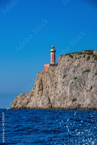 lighthouse on the rock © worm_ flag