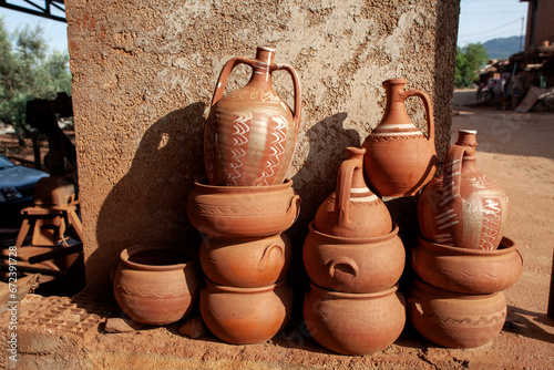 Rustic handmade brown terracotta vases and cups , Turkey