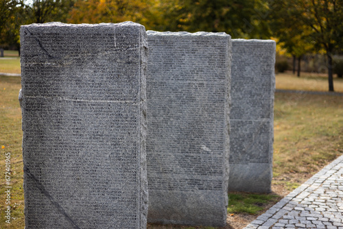 Kyiv. Kyiv region. Ukraine. 13.10.2023. Stone tombstones in the German cemetery in the fall. Beautiful German cemetery near Kyiv. Many dead German soldiers of the dead during the 2nd World War.