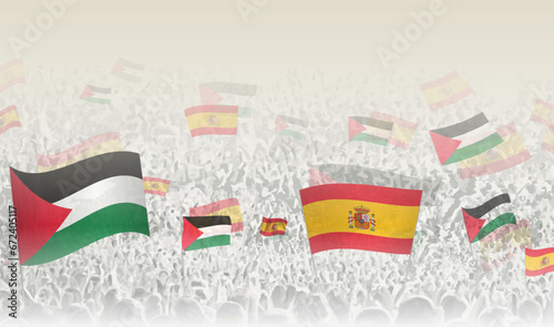 Palestine and Spain flags in a crowd of cheering people.
