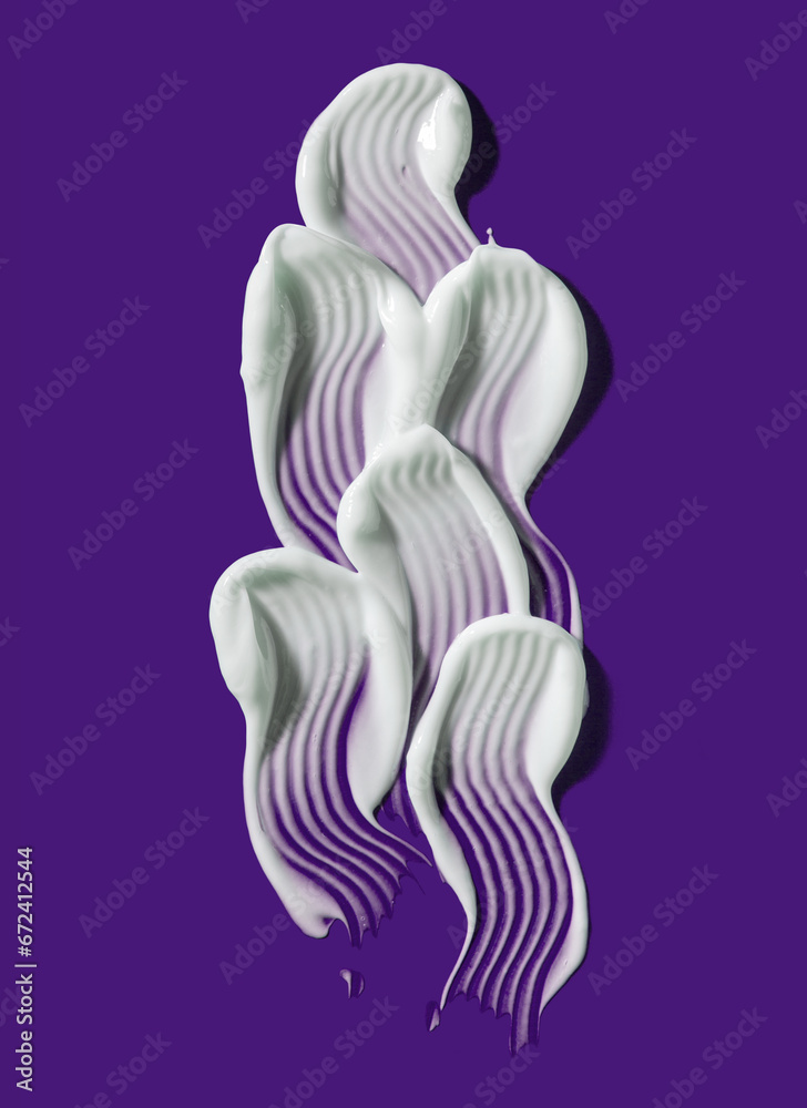 Face or body white cream hair balm dark purple background Face or body white cream hair balm dark purple background