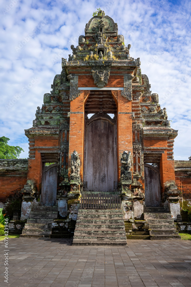 Majestic Balinese Temple Entrance with Ornate Carvings.