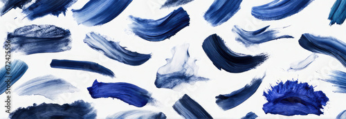 Elegant blue lipstick smears pattern, isolated on white background Acrylic blue paint brush photo