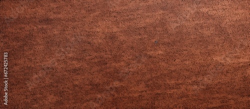 Close up view of a vintage sandpaper background with a rough and textured appearance