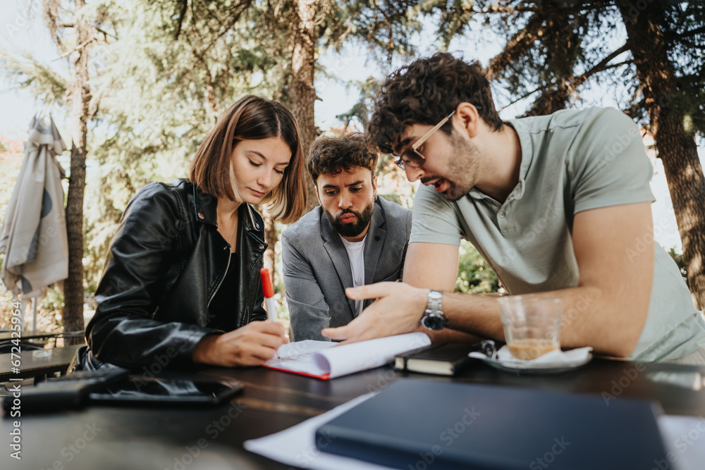 Business professionals strategizing outdoors at a downtown coffee bar, discussing budget management, innovation, and sales strategy for successful business growth.