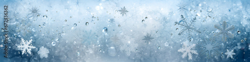 Frosty snowflake patterns on a blue background