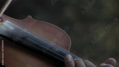 Man Playing Violin in Chaco Province, Argentina. Close Up.   photo