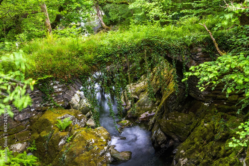 Old packhorse bridge, called Roman Bridge, North Wales, UK. Old packhorse bridge, called Roman Bridge, North Wales, UK.