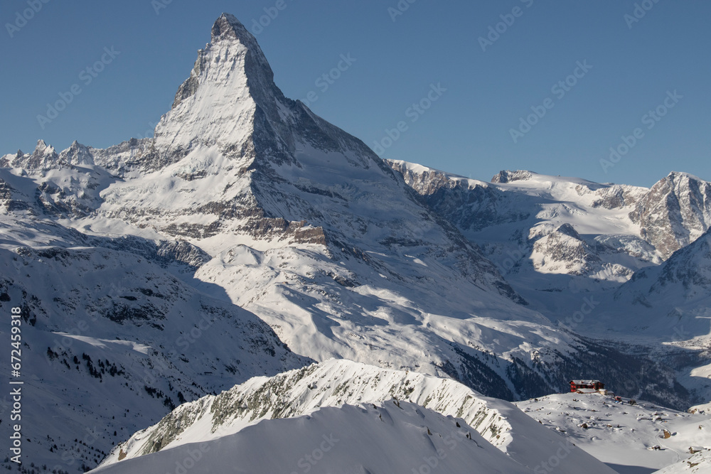 Idyllic mountain and landscape covered with snow against sky
