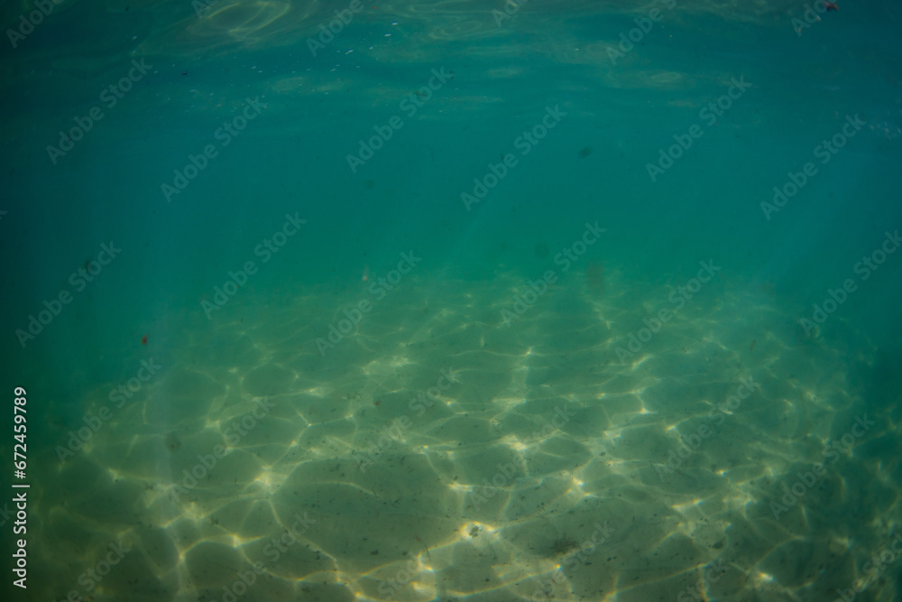 Beautiful wavy pattern on the sand underwater. Beautiful wavy pattern on the sand underwater.
