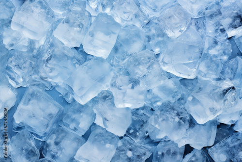 Ice cubes background texture. Ice cubes on blue background pattern. Frozen ice cubes.
