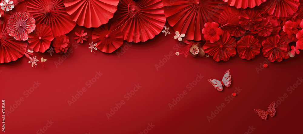 Paper flowers and a fan on red background. Copy space. Mockup for Chinese New Year. Paper flowers and a fan on red background. Copy space. Mockup for Chinese New Year.
