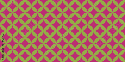 Simple geometric seamless pattern with green petals and magenta rhombus, vector illustration