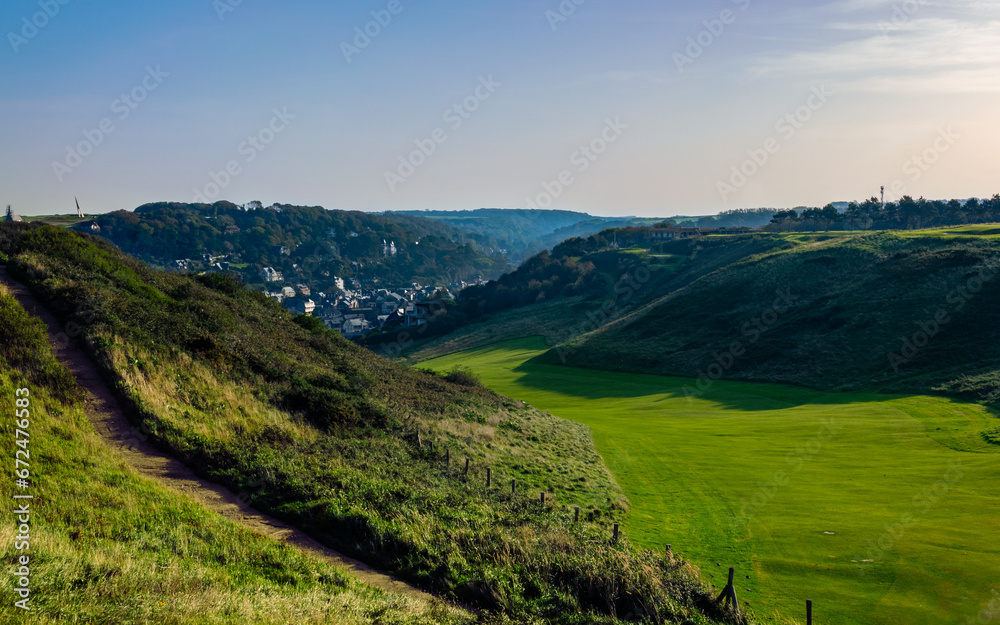 Naklejka premium landscape with hills and field