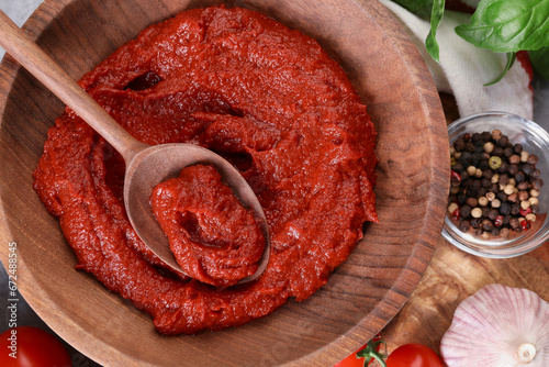 Tasty tomato paste and ingredients on table, flat lay