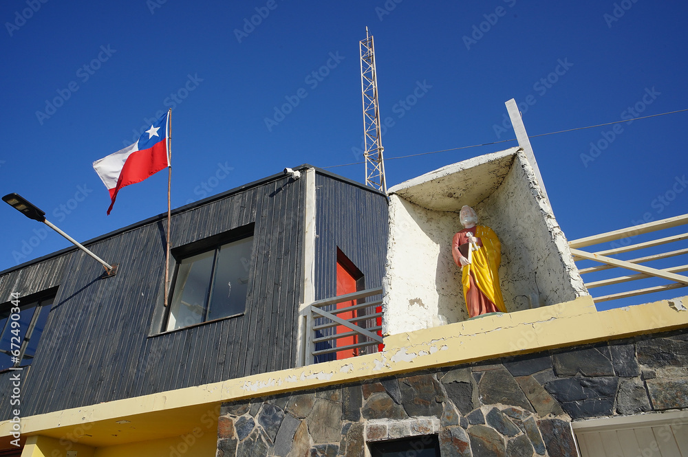 Statue of Saint Pedro on a building (Constitucion, Chile). Son Pedro keeps sailors and fishermen safe. Statue of Saint Pedro on a building (Constitucion, Chile). Son Pedro keeps sailors and fishermen safe.