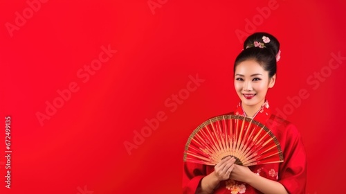 woman wearing red cheongsam chinese traditional holding fan