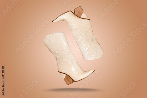 AI generated illustration of a pair of beautiful white women s boots on a brown background