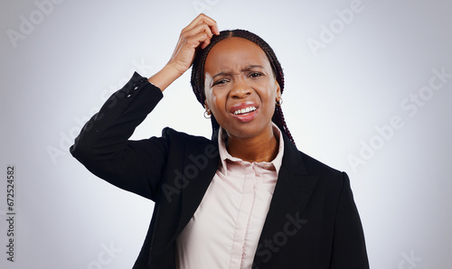 Confused, thinking and portrait of business woman scratching head in studio with doubt on grey background. Why, questions and face of lady entrepreneur with huh emoji for guess, forget or memory fail