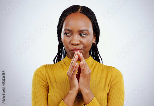 Canvas Print Thinking, black woman and scheme hands in studio for evil, planning or revenge on grey background