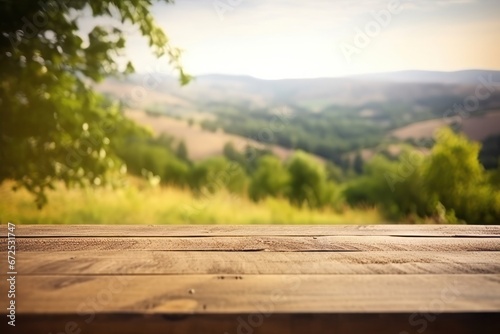 Wooden table in front of blurred landscape. Ready for product display montage