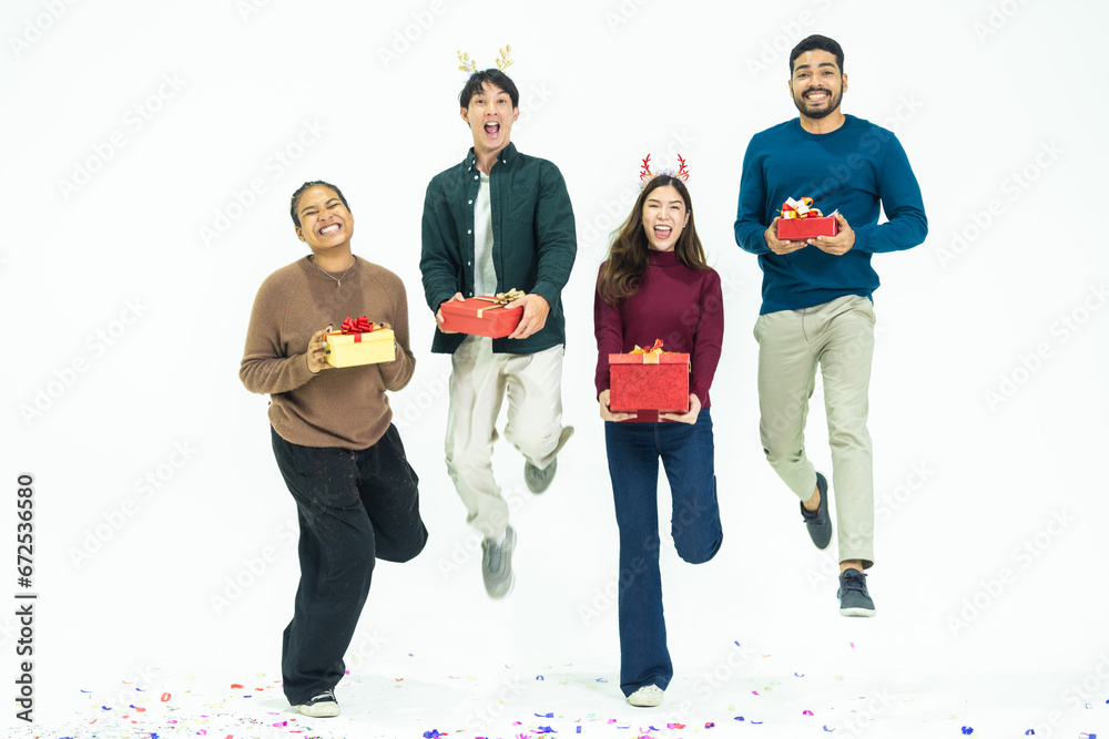 Young Asian friends man woman wearing casual clothes and holding present red box with gifts together isolated on white background studio portrait. concept new year and christmas gifts. Young Asian friends man woman wearing casual clothes and holding present red box with gifts together isolated on white background studio portrait. concept new year and christmas gifts.