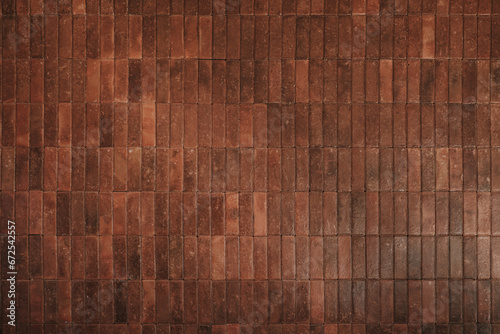 Modern, shiny, and luxury brown brick wall texture. Industrial interior design. Suitable for background.