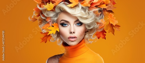 The concept of autumn fashion features a stunning woman adorned with beauty fashion and leaves on her head This includes incorporating makeup and embracing the seasonal theme