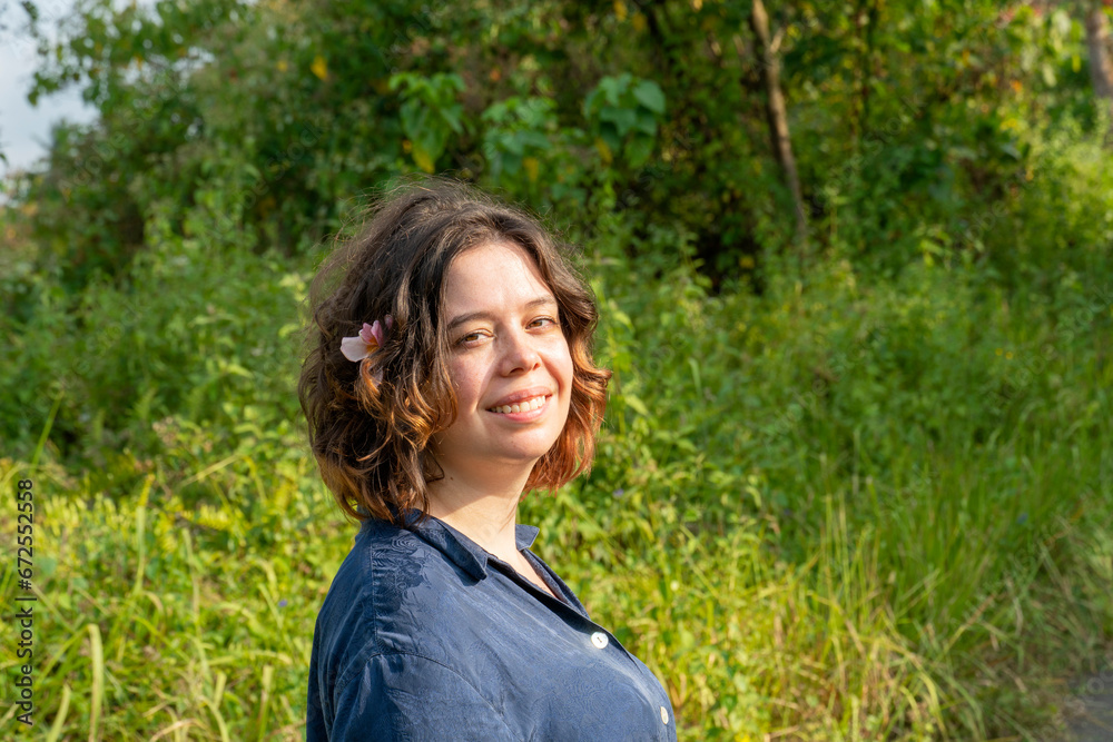 Woman on trip, walking and hiking through terraces in Bali