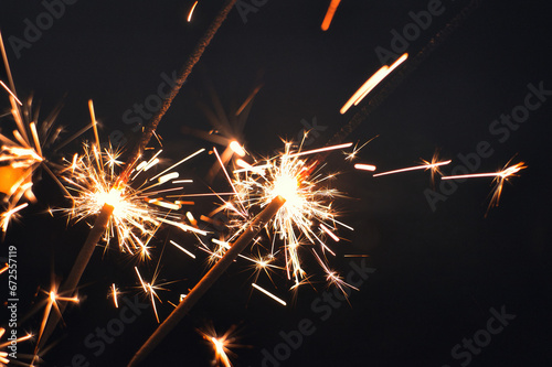 Sparkler and Fireworks - Wunderkerze - Neujahr   Silvester   Feier - Glittering - Burning Sparkler  Happy New Year  - Blurred Bokeh Light