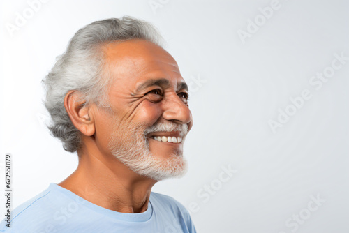 a man with a white beard and a blue shirt