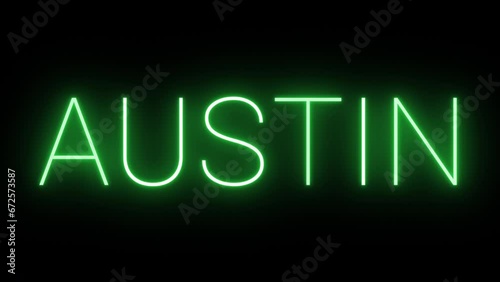 Flickering neon green glowing austin sign animated black background.