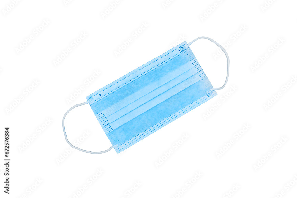 Blue medical mask , isolated on a white background. Concept of coronavirus problems, lockdown and quarantine due to the pandemic Blue medical mask , isolated on a white background. Concept of coronavirus problems, lockdown and quarantine due to the pandemic