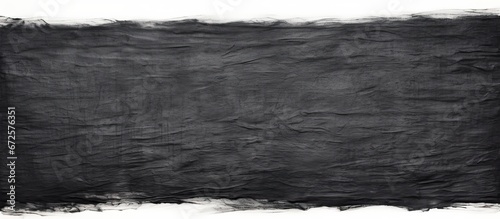 On a backdrop of white paper there is a pastel texture created by black charcoal The artwork consists of abstract pencil strokes photo