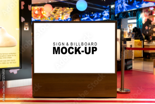 Sign and Billboard Mockup at duty free shop in departure terminal