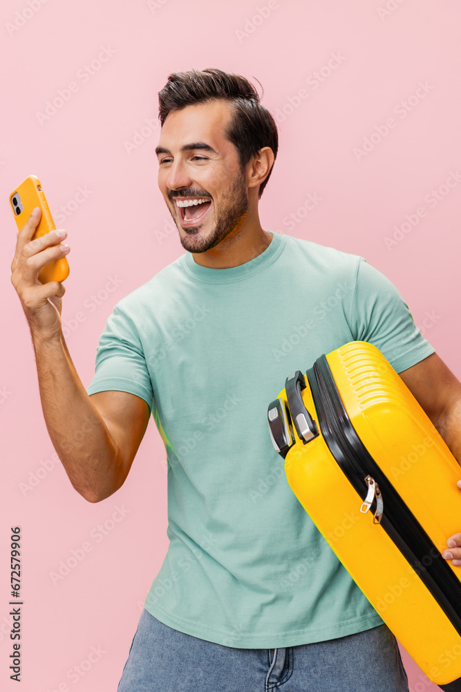 Smartphone man service mobile phone traveler travel smile baggage guy suitcase white studio Smartphone man service mobile phone traveler travel smile baggage guy suitcase white studio