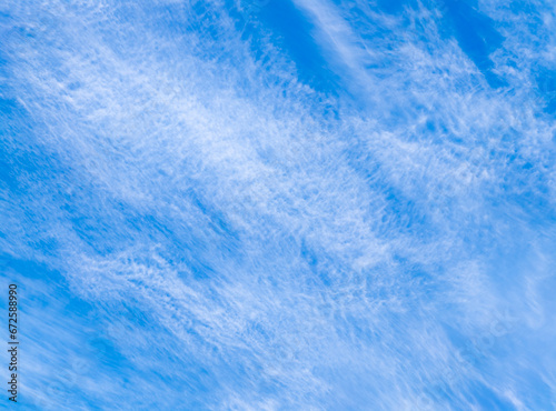 Blue sky with beautiful thin spindrift clouds. Background.
