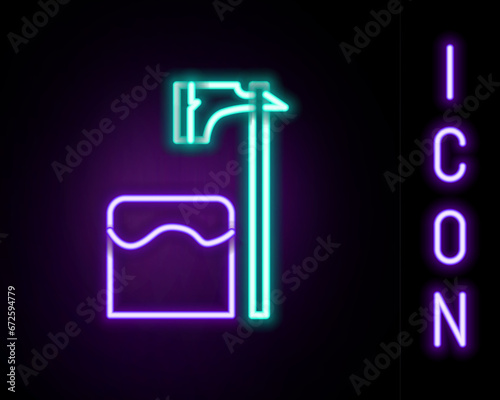 Glowing neon line Executioner axe in tree block icon isolated on black background. Hangman, torturer, executor, tormentor, butcher, headsman. Colorful outline concept. Vector