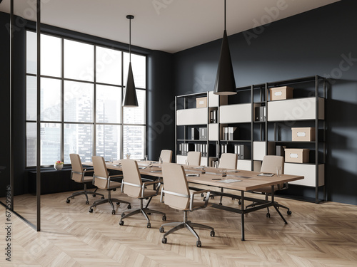 Stylish meeting room interior with table and armchairs, shelf with panoramic window